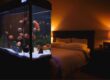 Fish tank at the foot of the bed